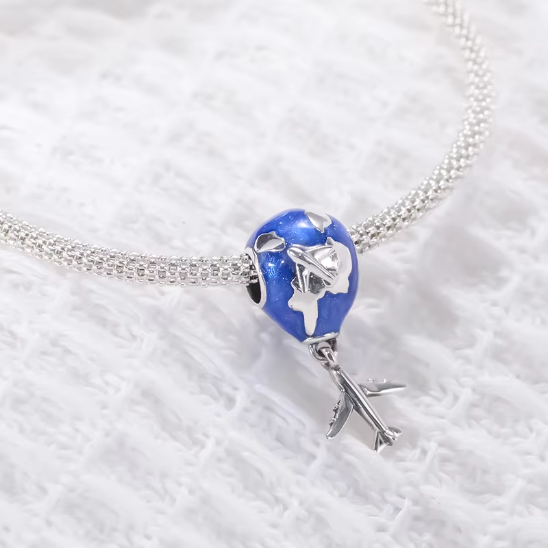 Berloque Globo com Avião