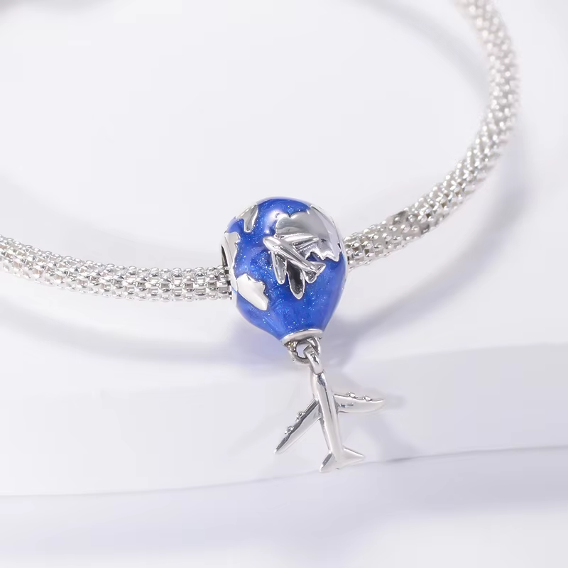 Berloque Globo com Avião